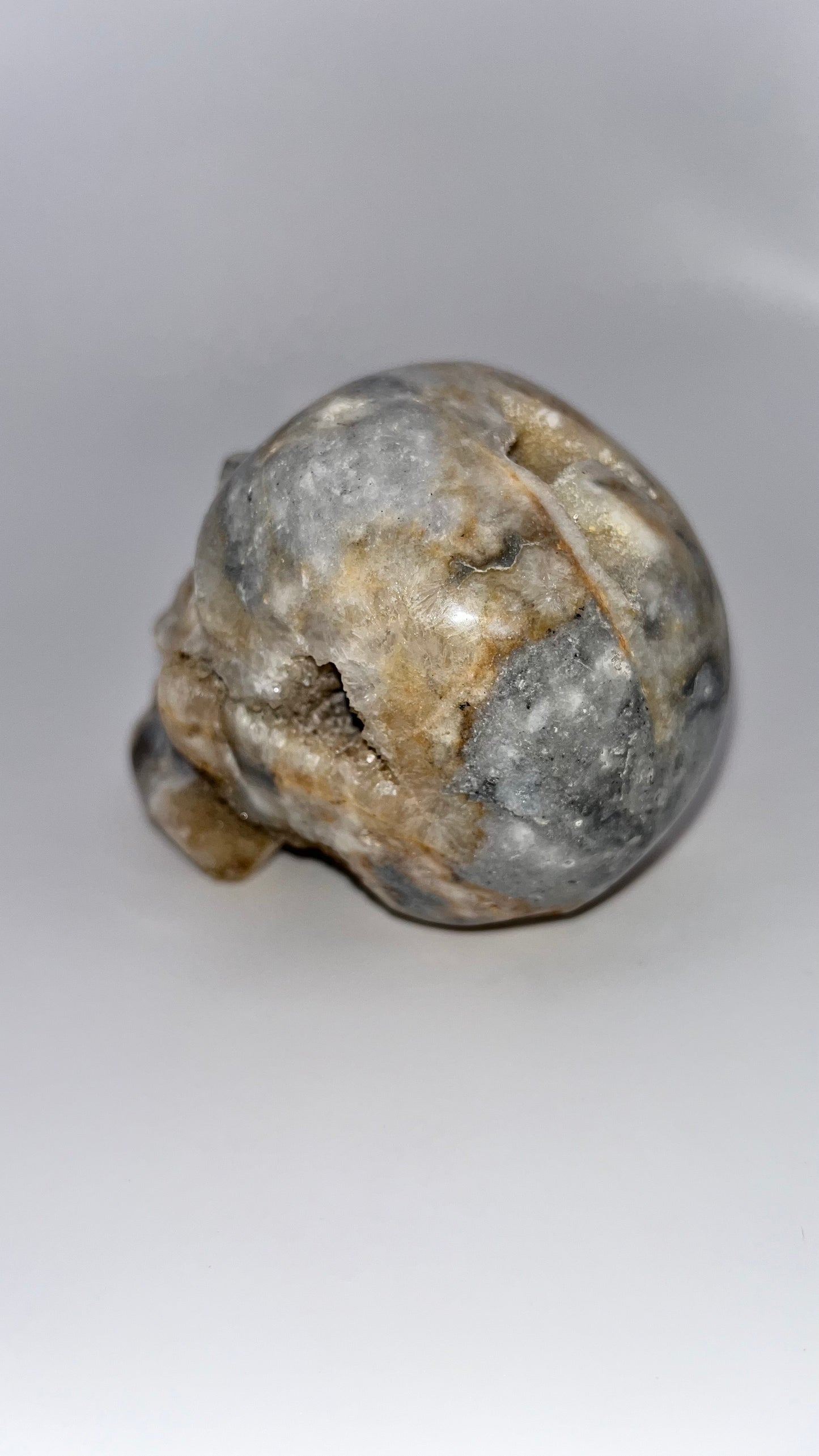 Quartz crystal druzy skull carving
