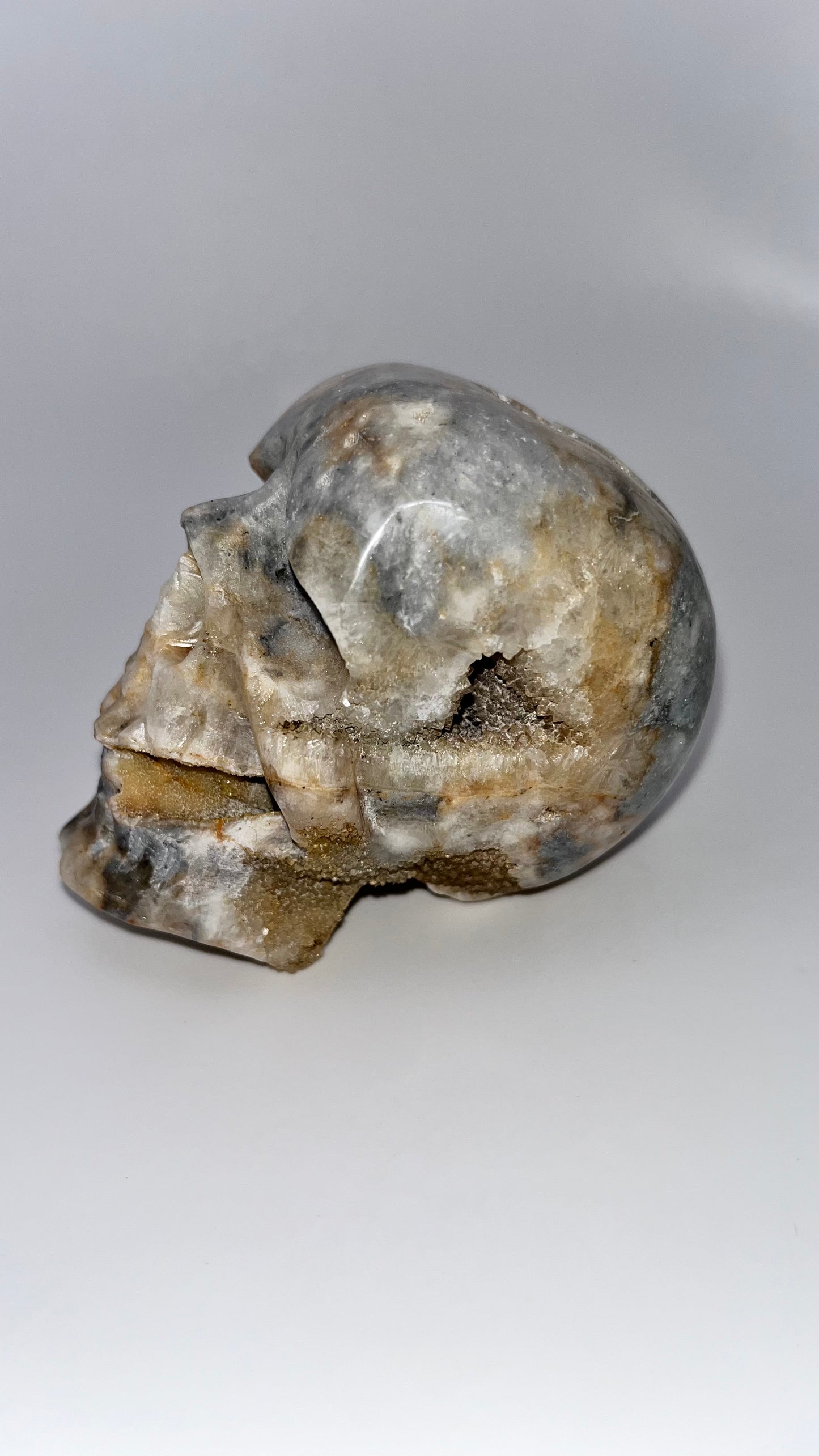 Quartz crystal druzy skull carving