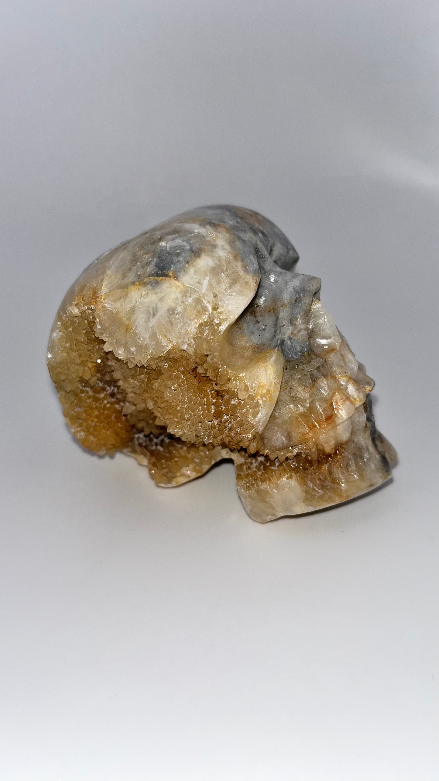 Quartz crystal druzy skull carving