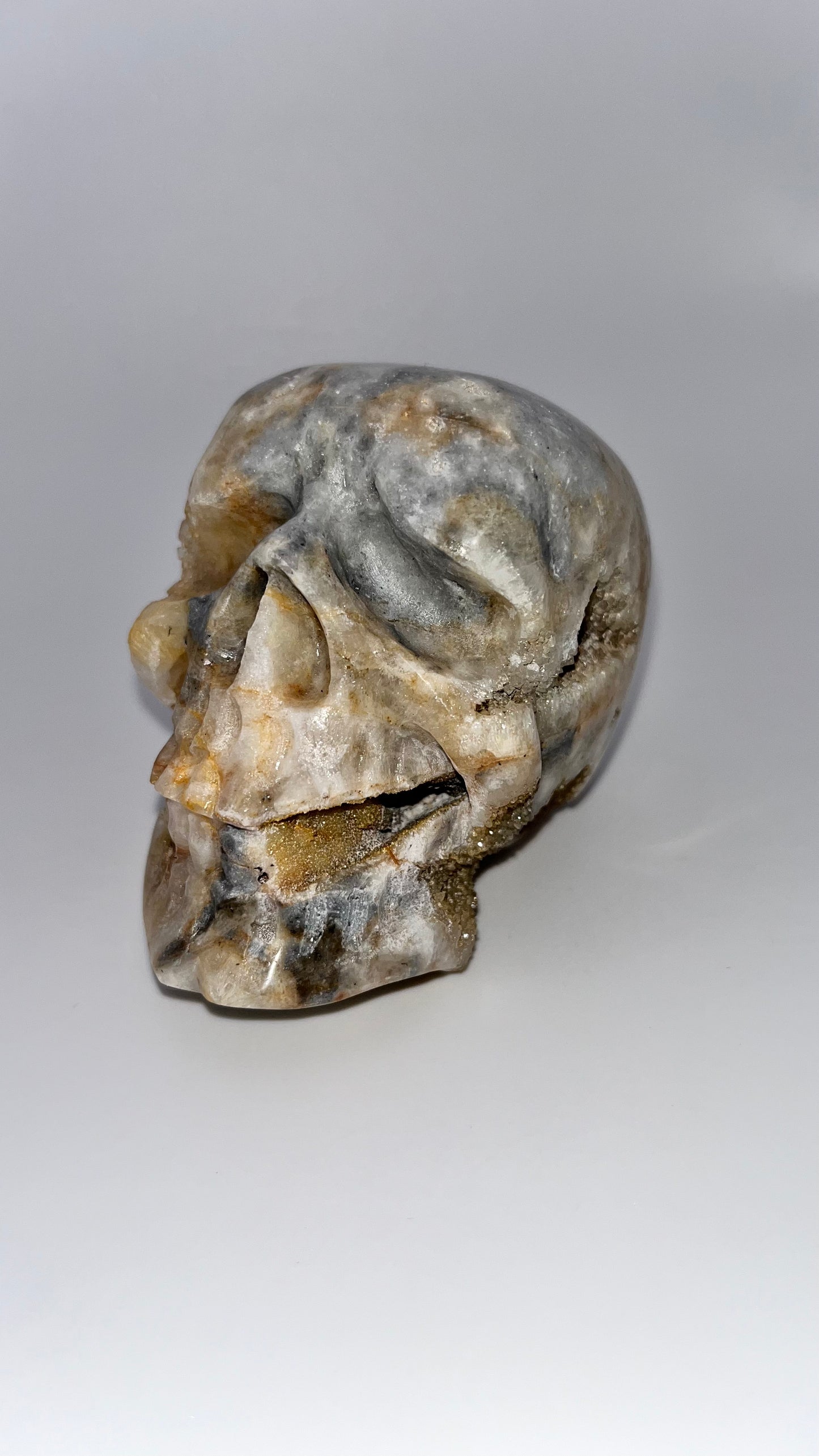 Quartz crystal druzy skull carving