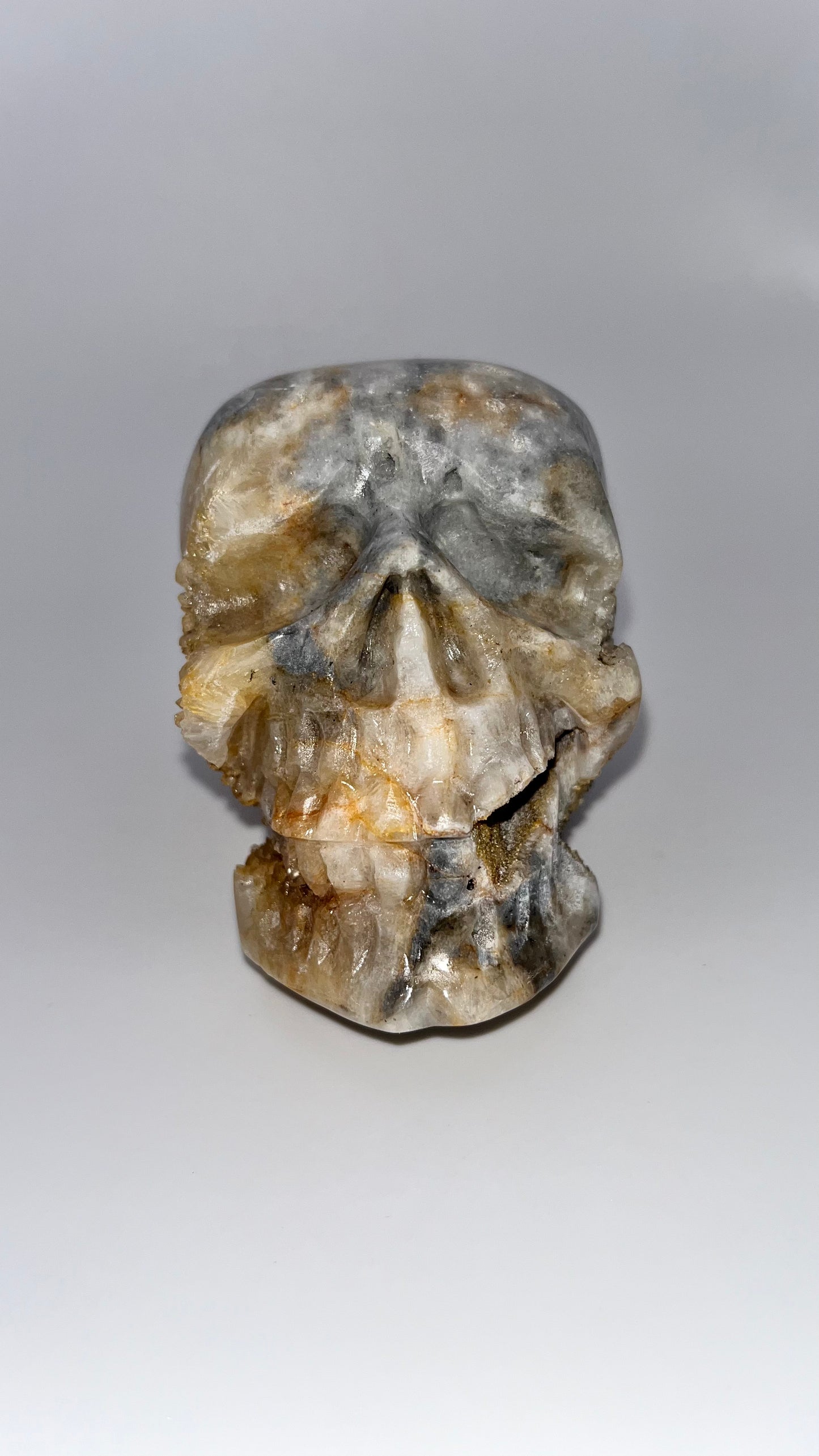 Quartz crystal druzy skull carving