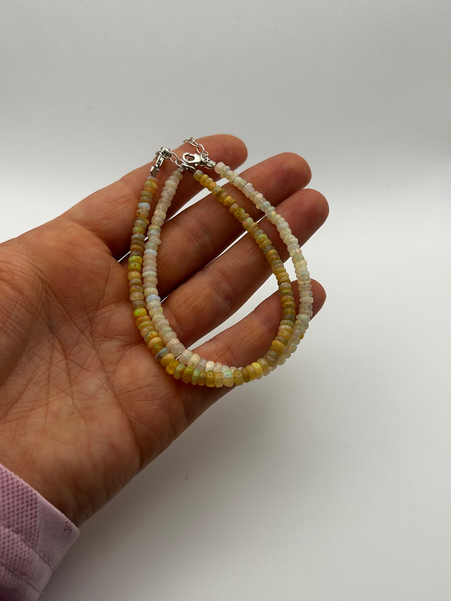 Beaded Opal Necklace & bracelet on Steel Strand with Silver Clasp.