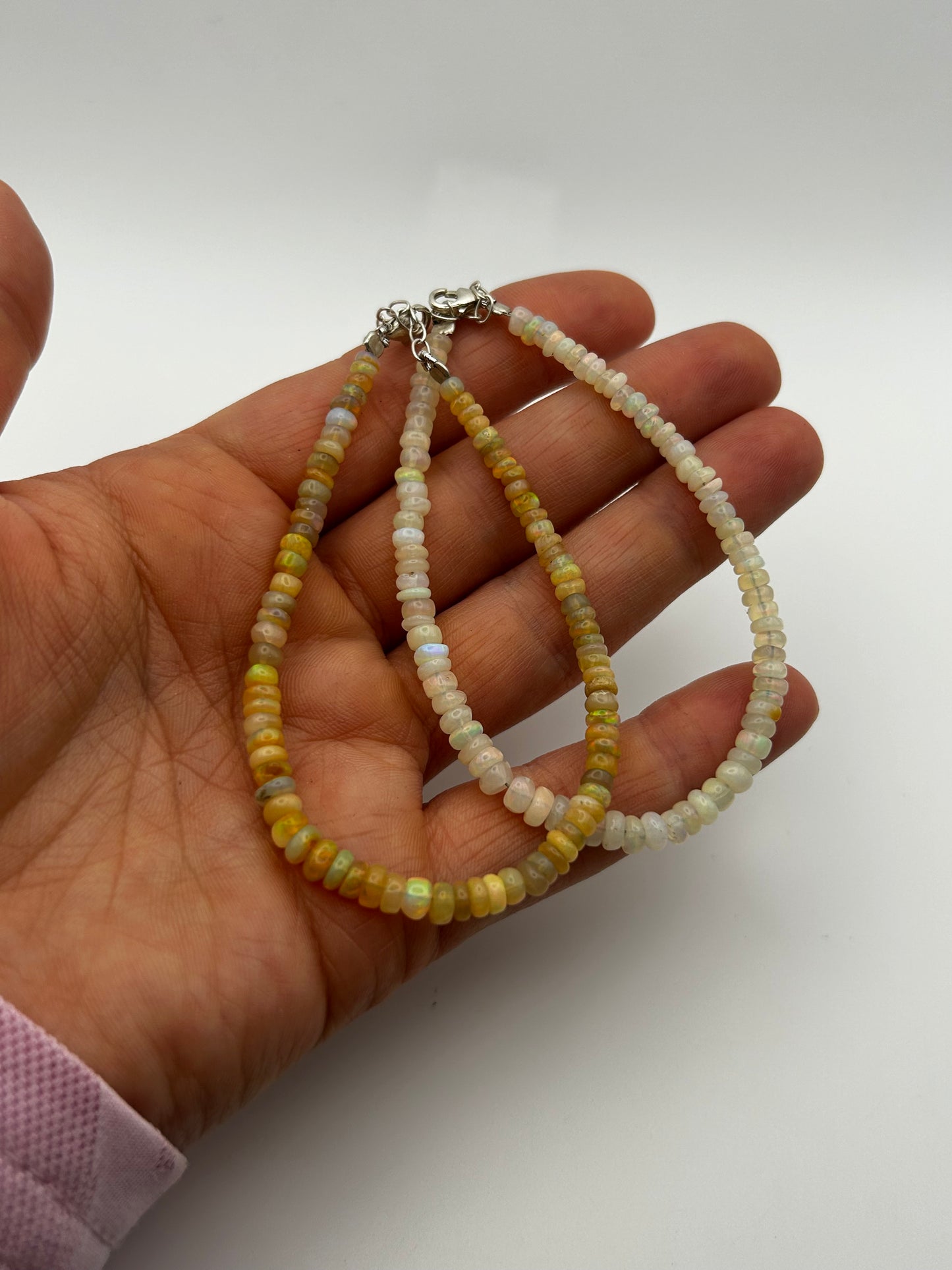 Beaded Opal Necklace & bracelet on Steel Strand with Silver Clasp.
