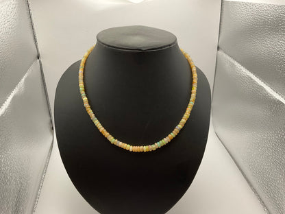 Beaded Opal Necklace & bracelet on Steel Strand with Silver Clasp.